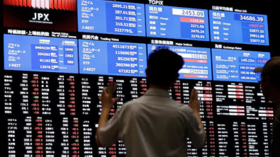 Asian Stocks Fall after Fed Flags Slower Rate Cuts, BOJ Stands Pat